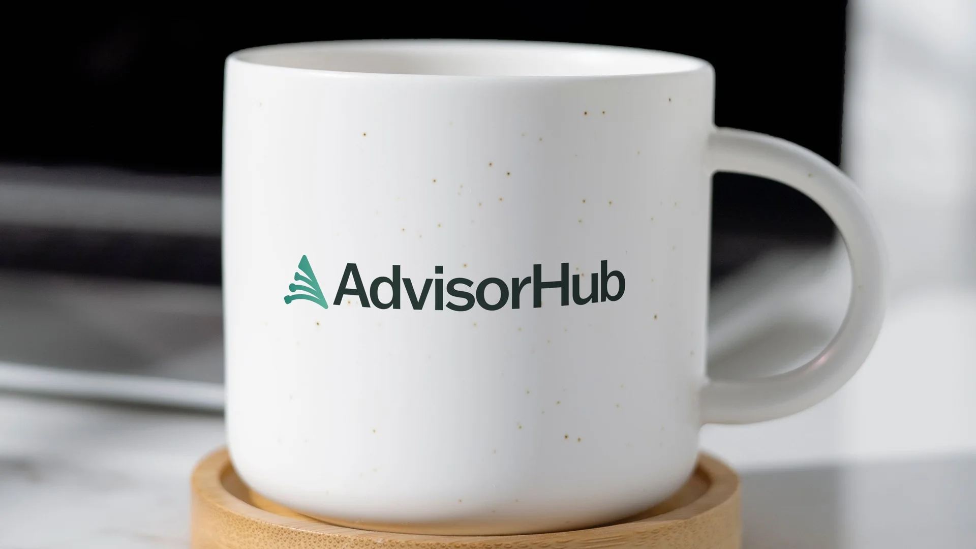 Company mug with the horizontal AdvisorHub logo